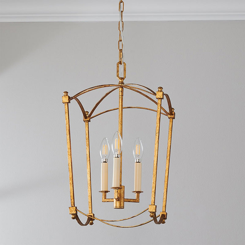 Gilt lantern pendant in an entryway